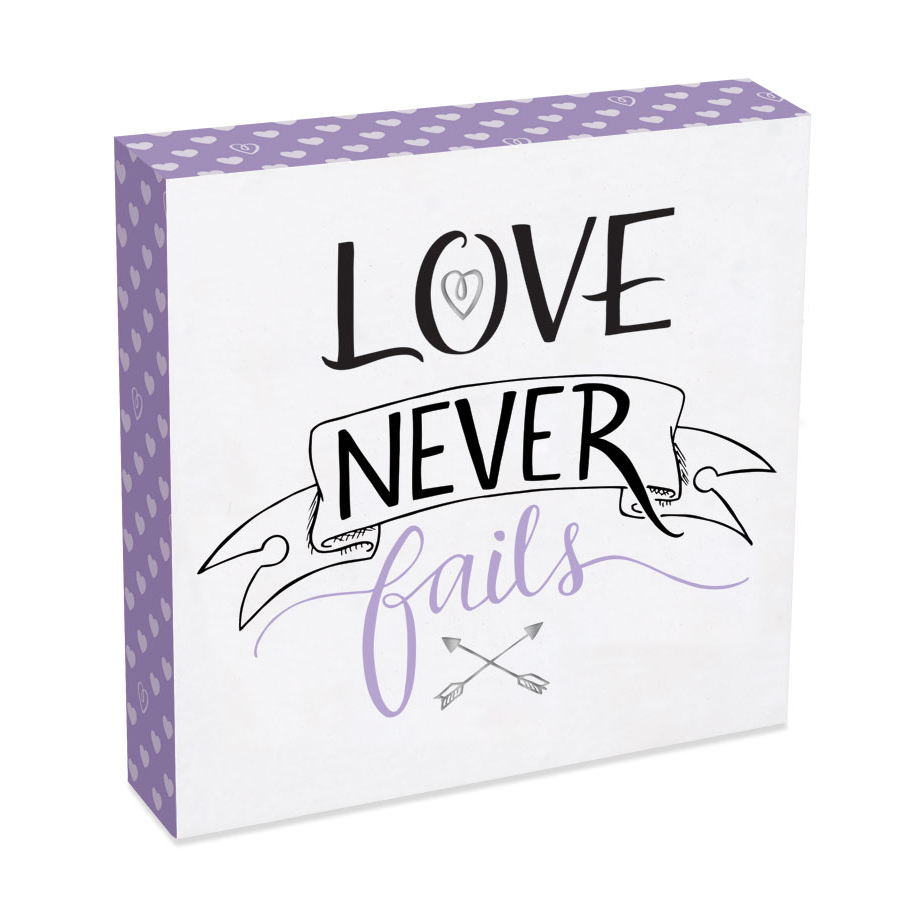 Love Never Fails Wall Decor Plaque